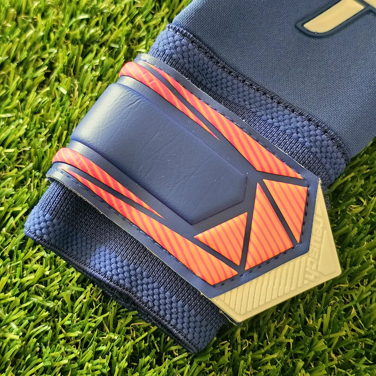 Guanti da portiere Reusch Attrakt Gold X Evolution GK26 cinturino