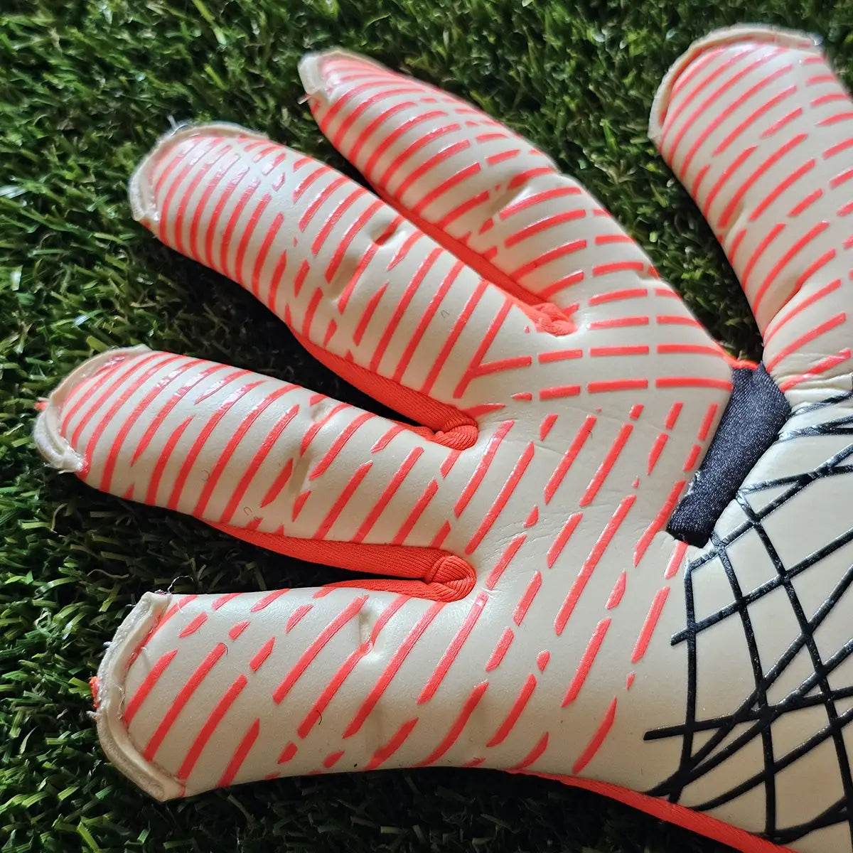 Guanti da portiere Uhlsport FM ZNE Ultragrip HYBD taglio dita