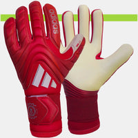 Guanti da portiere Adidas Copa Pro rossi su
